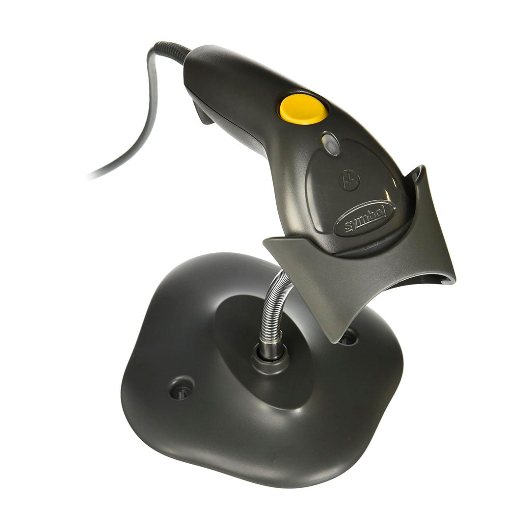 Lector de código de barras con base y botón amarillo, ideal para punto de venta y captura de datos.