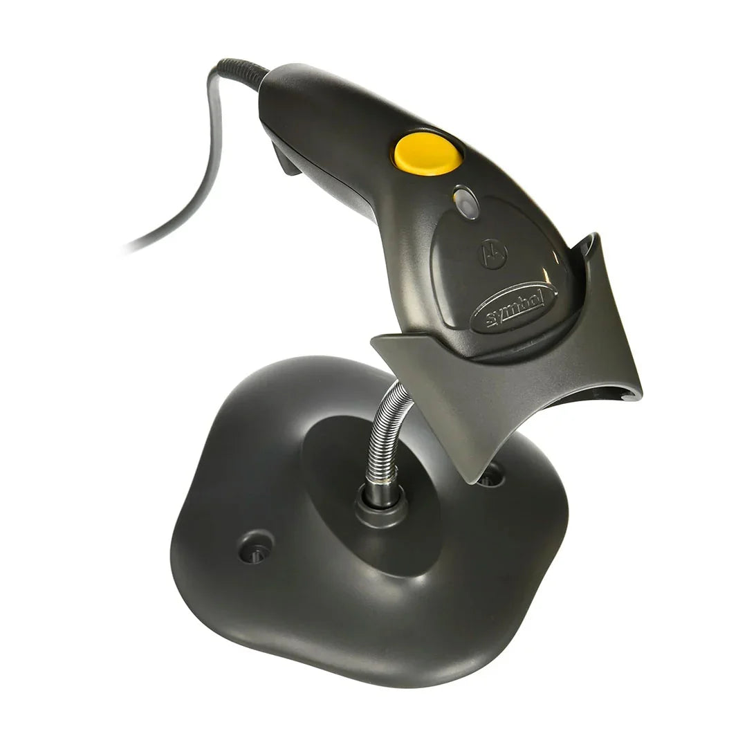 Lector de código de barras con base y botón amarillo, ideal para punto de venta y captura de datos.